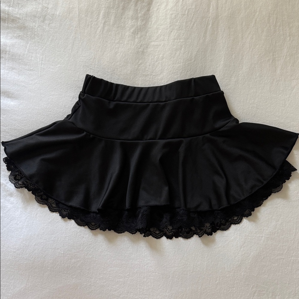 Chic Black Skater Skirt with Lace Hem